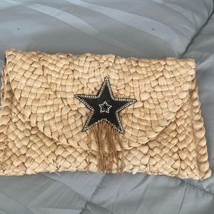 Brand new straw embellished clutch